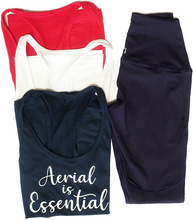 Load image into Gallery viewer, Red, white and blue Aerial is Essentials racerback tank shown with navy leggings