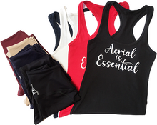 Load image into Gallery viewer, Aerial is Essentials racerback tanks shown with leggings