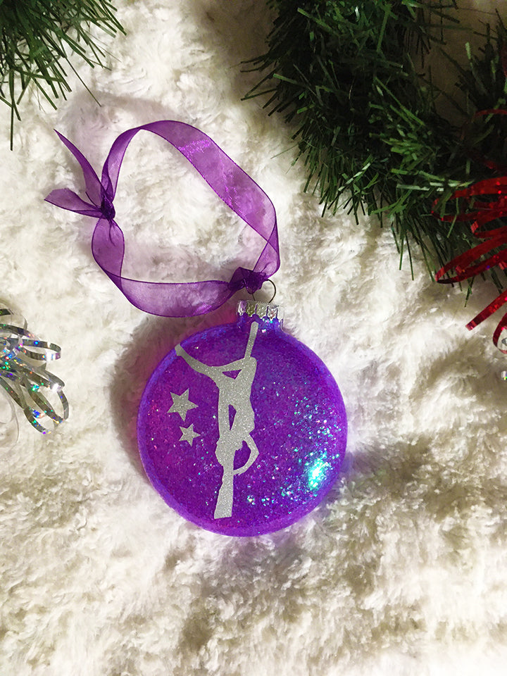 Sllver aerialist on purple glass ornament